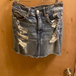 Ripped denim skirt
